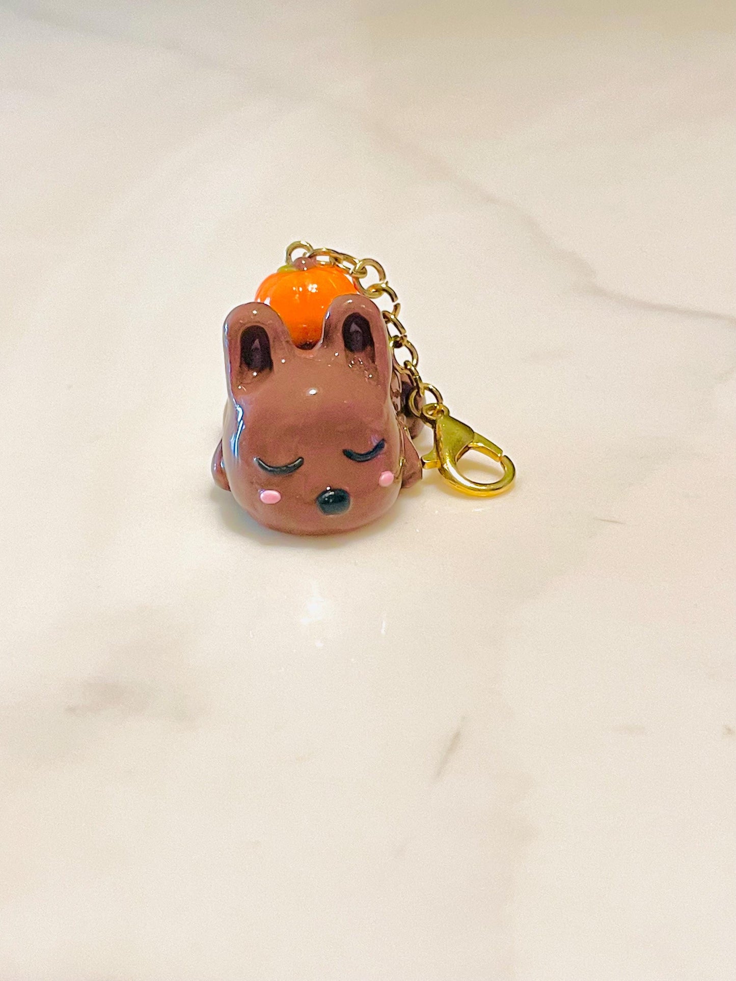 Polymer Clay Sleepy Bunny With a Pumpkin Charm